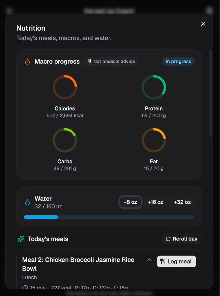 Nutrition day view with calorie and macro rings, water tracking, and today's meals